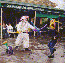 Two clowns sword fighting