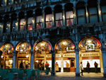 Shops along Piazza San Marco.  You can also see cafes.  The first coffee shop was opened on San Marco at the end of the 17th century.  By the 18th century, there were 24 in Piazza San Marco.